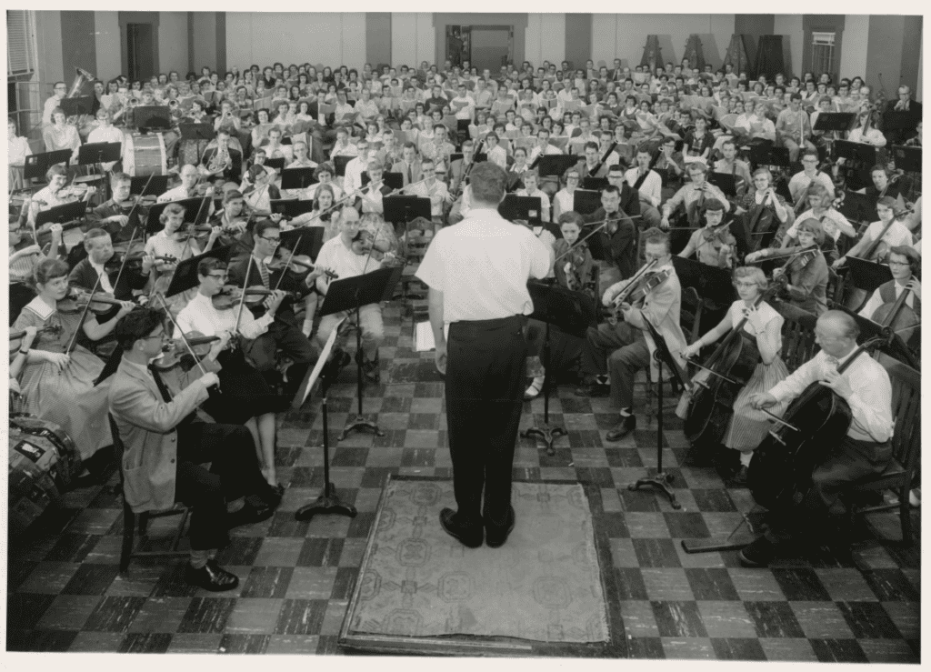 James Dixon conducting the University of Iowa Symphony Orchestra during rehearsal in the 1950s.