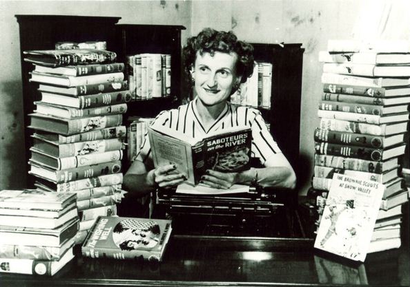 Nancy Drew author Mildred Wirt Benson among her books, Toledo, 1949 | Mildred Wirt Benson Collection