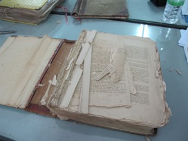 A rare book that is so brittle its pages has pieces missing