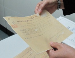 Mended document showning the handmade paper backing where original is missing