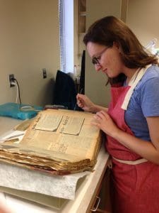 Kate examining the stability of the pages.