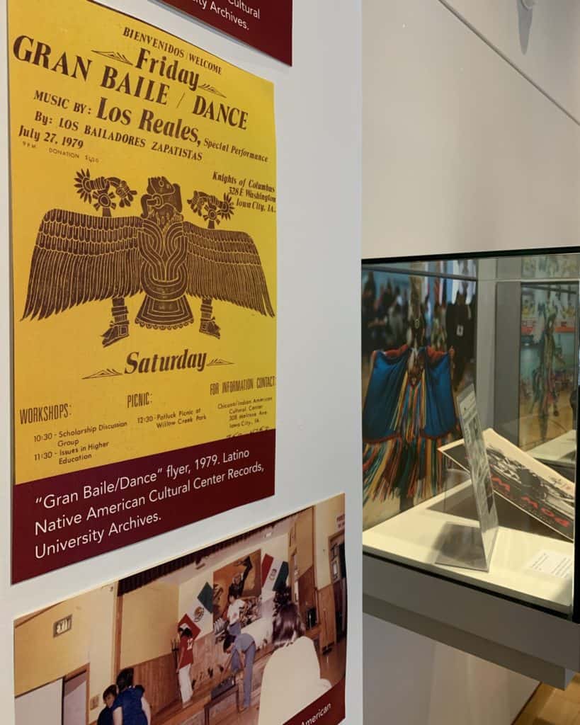 A photo showing a poster and photos on display in the Main Library Gallery.