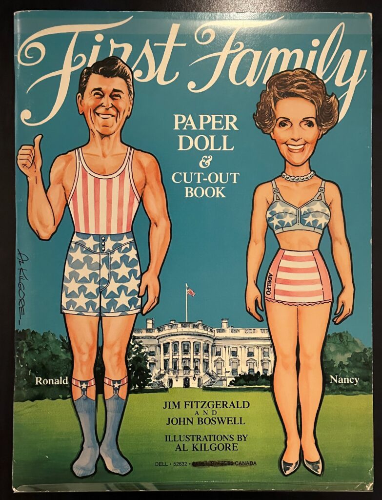 The cover of a paper doll book featuring illustrations of Ronald and Nancy Reagan in undergarments decorated in the style of the American flag.