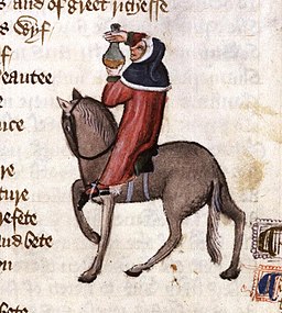 image of hooded man on horse with bottle of potion