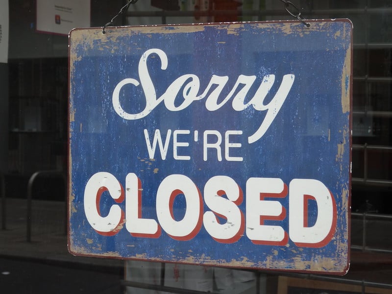sign saying sorry we're closed/blue and white, distressed