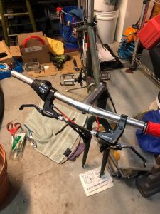 disassembled bike being rebuilt in garage