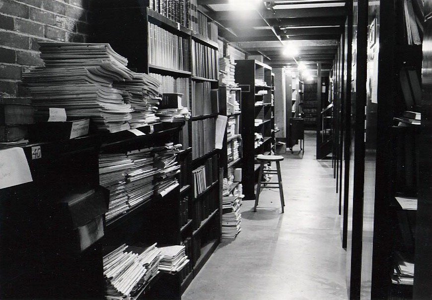 dark basement library stacks