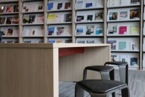 Table and stools near the Current Journals shelving