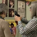 two women visiting the beatles exhibit at Lunch with the Chefs