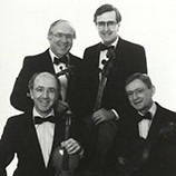 Stradivari Quartet posed with instruments in the 1990s