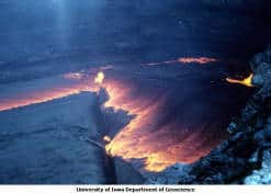 Image of Cool dark lava subducting, exposing red-hot lava