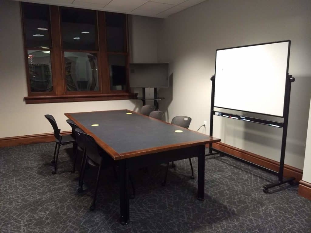 Photo of table and white board