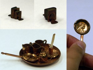 Miniature set of pots and pans made from pennies - University of Iowa Special Collections