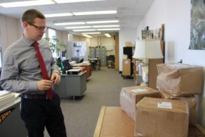 Patrick Olson inspecting packages