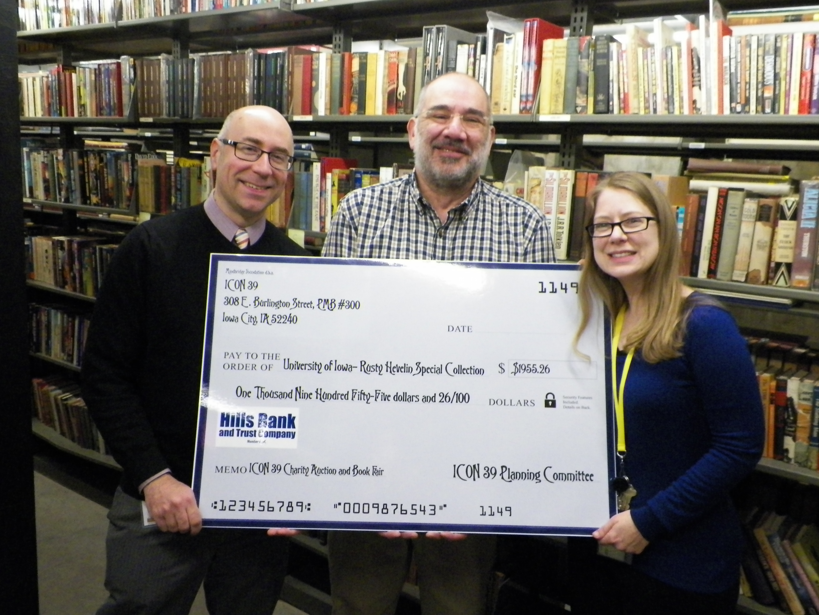 Special Collections staff with an oversized check