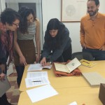 Students looking at a book