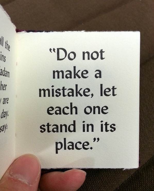Page from a book with quote "Do not make a mistake, let each one stand it its place."