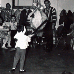 Boy hitting a pinata at a LULAC party in 1967