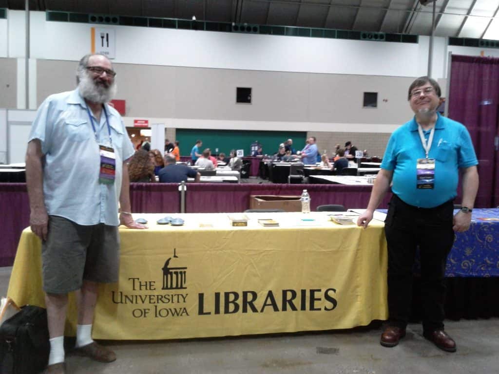 Peter and Higgins at the UI libraries table at World Con