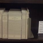 Shelf with artists books in boxes