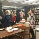 Iowa Bibliophiles browsing new acquisitions
