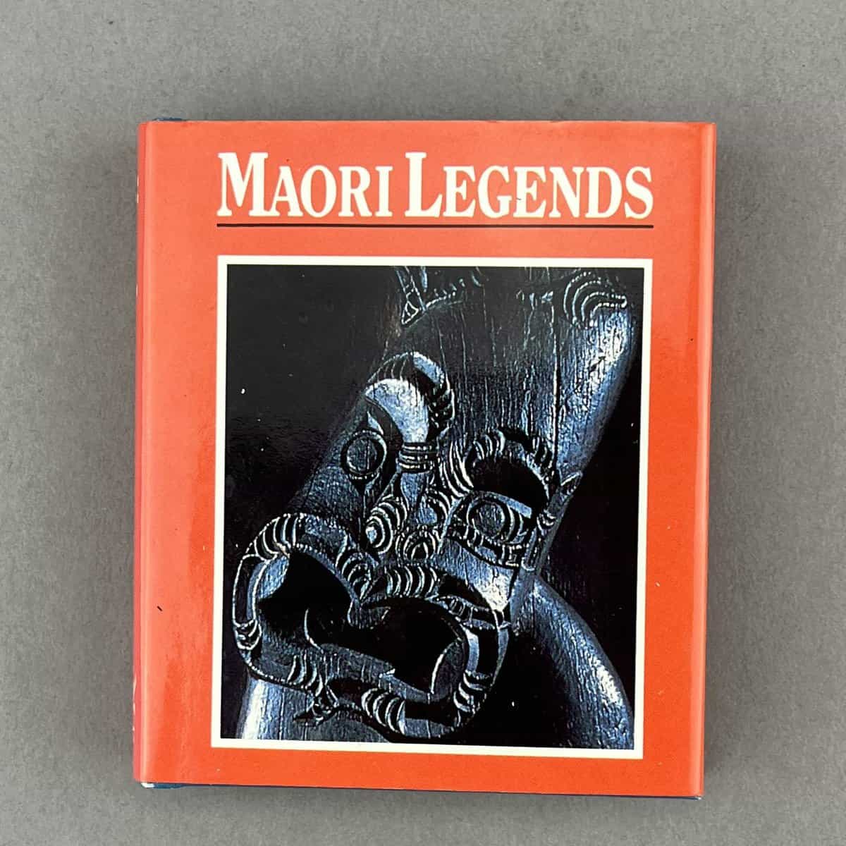 Cover of book showing carved wooden figure