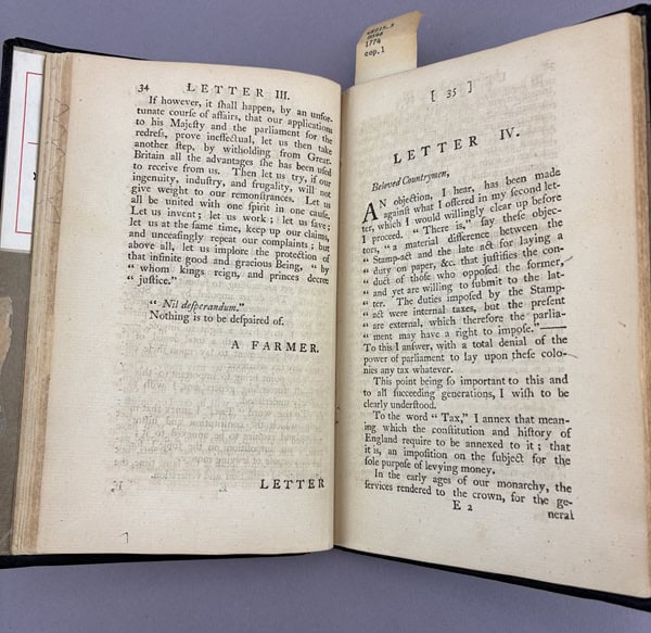 Book open to a letter
