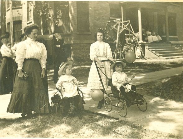 Women strolling children, Iowa City, Iowa, 1910s | Noble Photographs