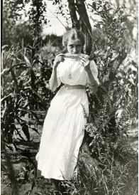 Esther eating corn, early 1900s | Iowa Women's Archives Images