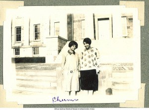 Althea Moore and friend on steps of Old Capitol, Iowa City, Iowa, between 1924 and 1928